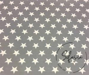 Plain White Starry Fabric on Gray Background